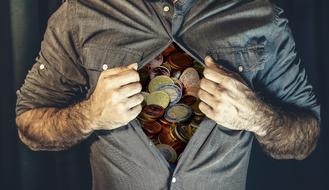 coins under a man's shirt