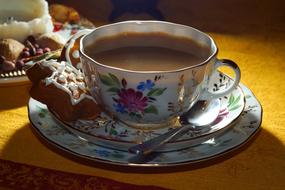 delicious sweet coffee with cookies
