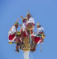 The dancers tower the sky beautifully