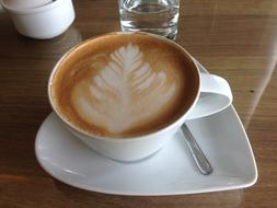 coffee with a pattern on the table