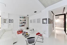 white kitchen with chairs