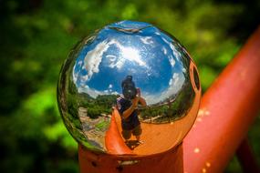 silver ball on red