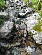 water fountain with stones