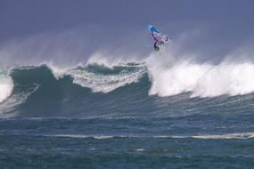 a man on a sea wave