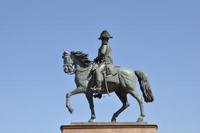 A man on a horse sculpture