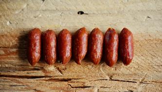 sausages wooden table