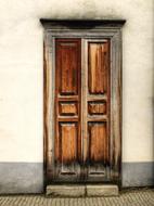 white building facade and old entrance door