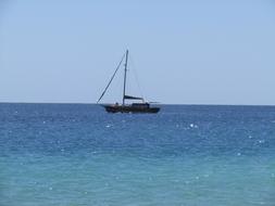 A black ship in the water