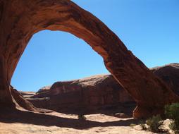 stone arch against a blue background