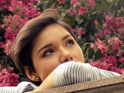 Girl face and pink flowers