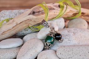 jewelry lying on stones