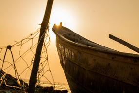 sunrise over a fishing boat close up