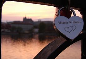 love lock on bridge in view of city, czech, Prague