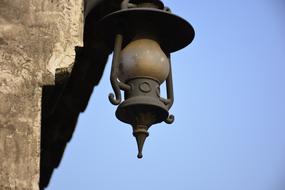 The lamp is old on the roof