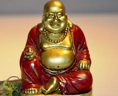 golden and red Buddha Sculpture