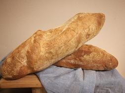 crusty bread against the wall