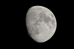 large moon under the telescope