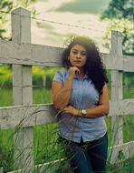 Women Model and wood fence