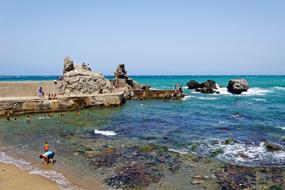 cozy beach with rocks