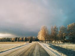 a street with winter and fall