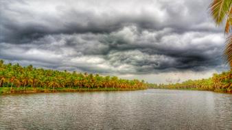 river water grass clouds