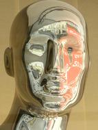 A silver mask on a man