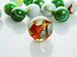 red ball with green and silver