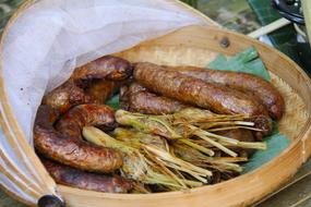 Sausages fried on the campfire