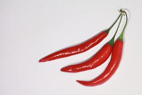 Three long hot peppers