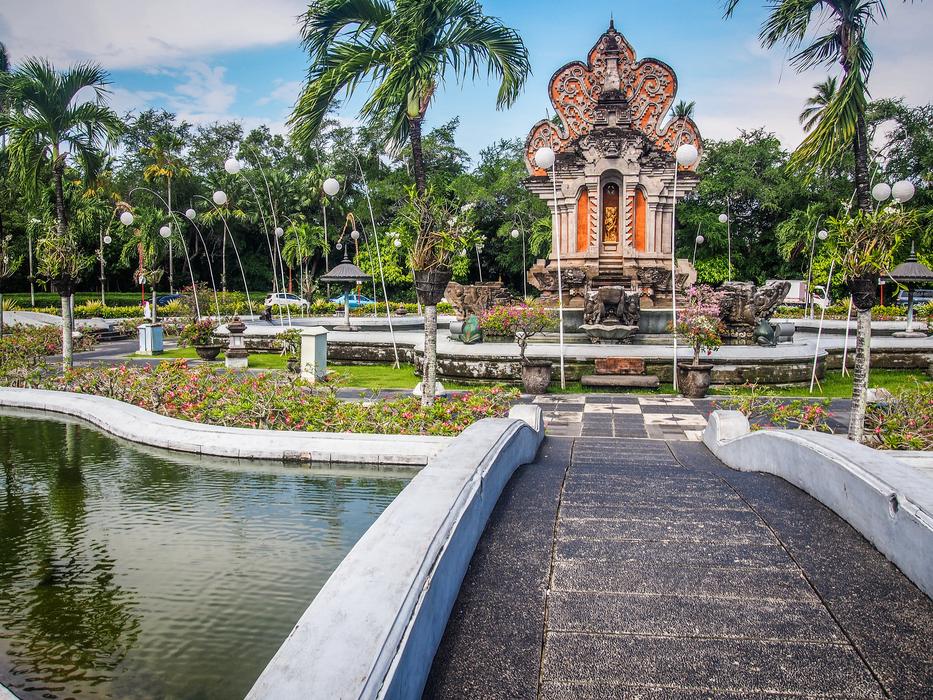 a beautiful building by the lake