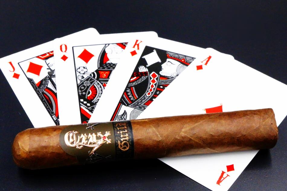 a cigarette at the cards