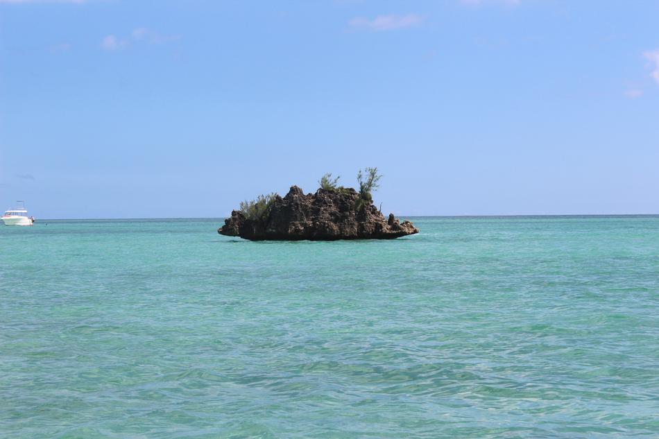 stone rock in the blue ocean