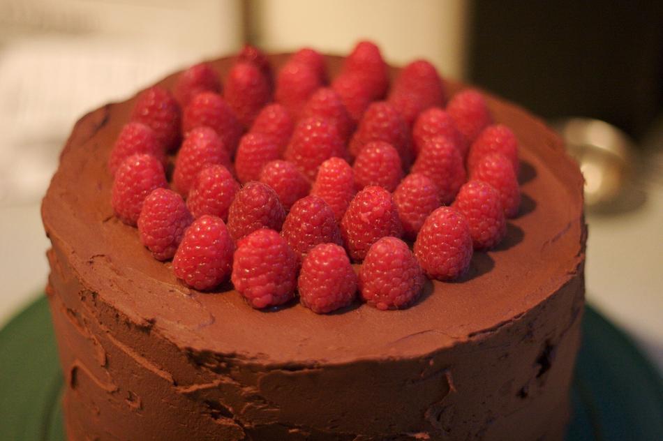 Chocolate cake decorated with raspberries