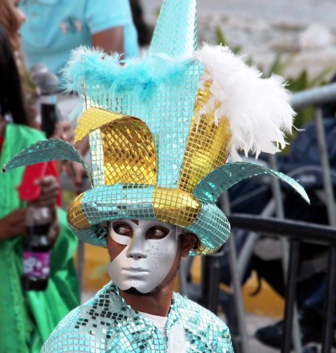 Man in colorful carnival costume and mask in Dominican Republic