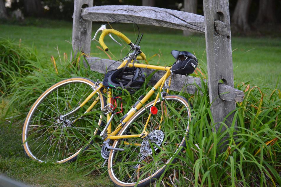 yellow bike on the grass