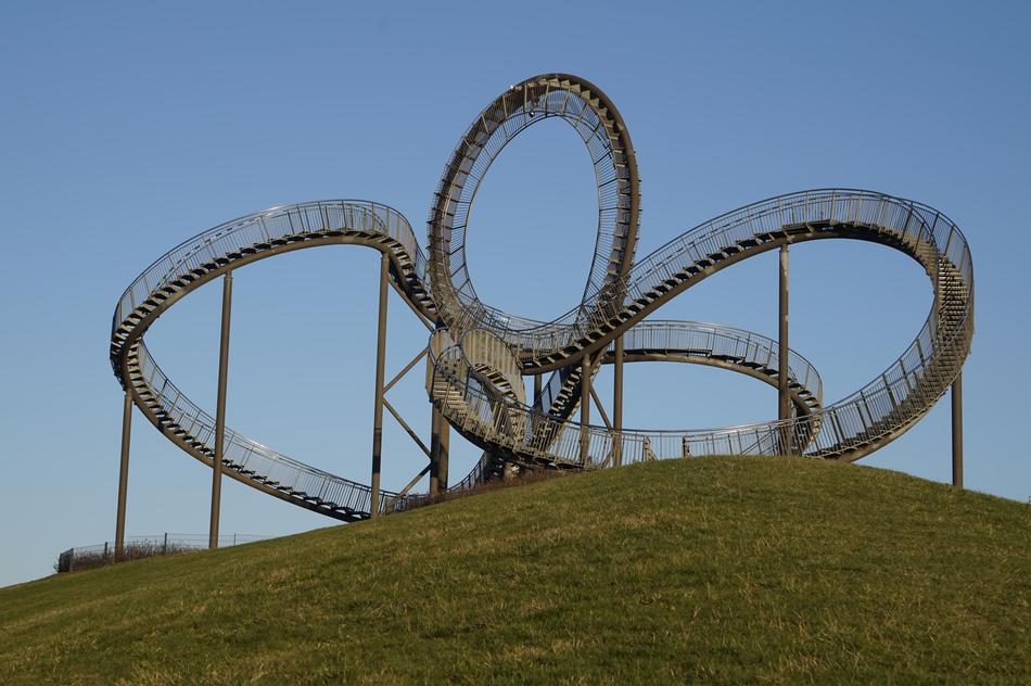 A swirling sculpture of amusement rides
