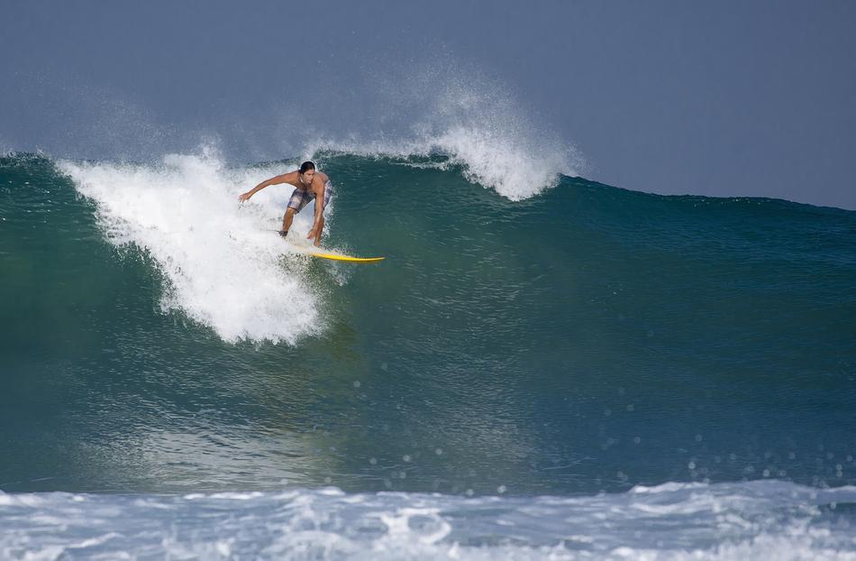 man on a board in the ocean