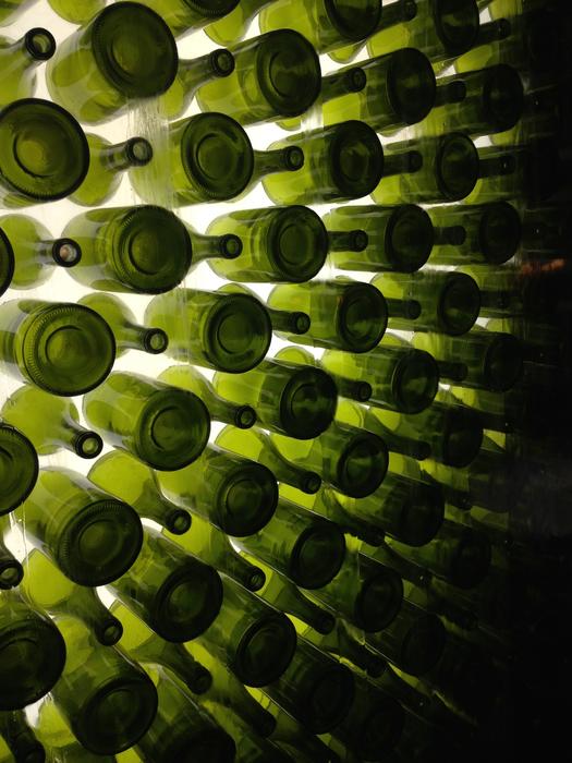 a wall of glass bottles