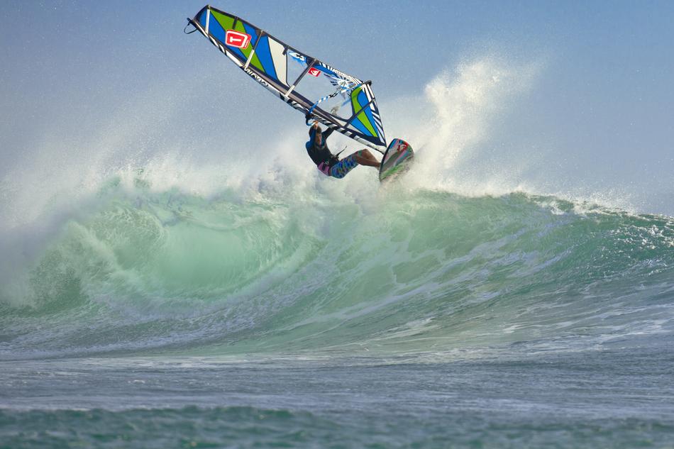 the guy with the boat on the waves