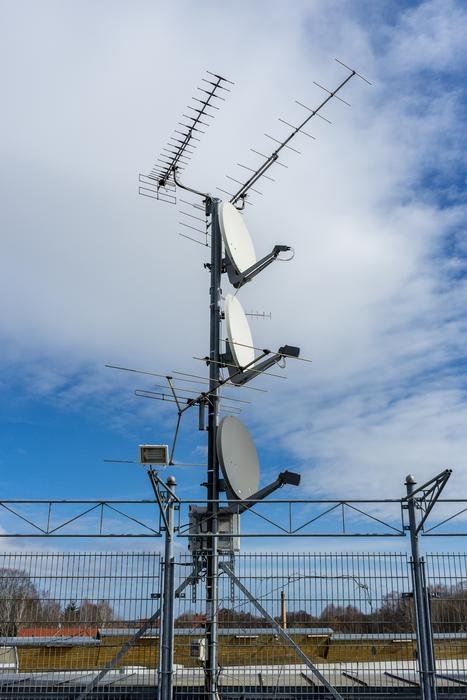 the antenna is behind the fence