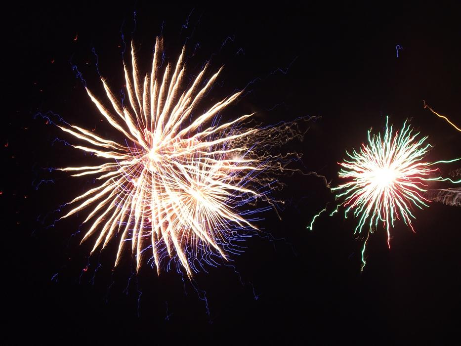 fireworks in the urban night sky