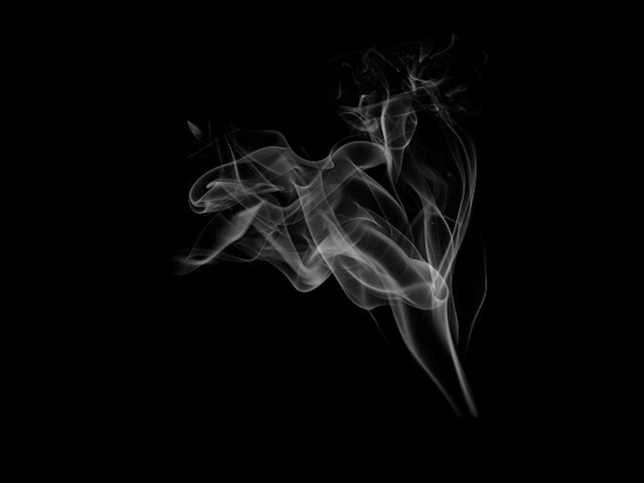 white smoke on a black background