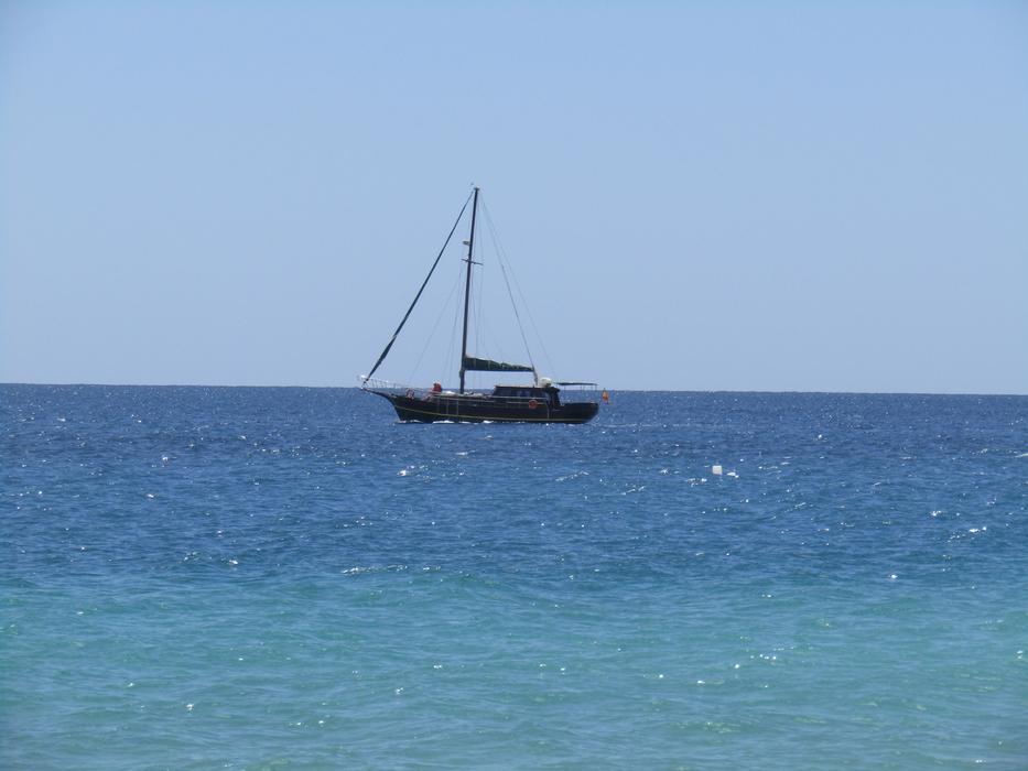 A black ship in the water