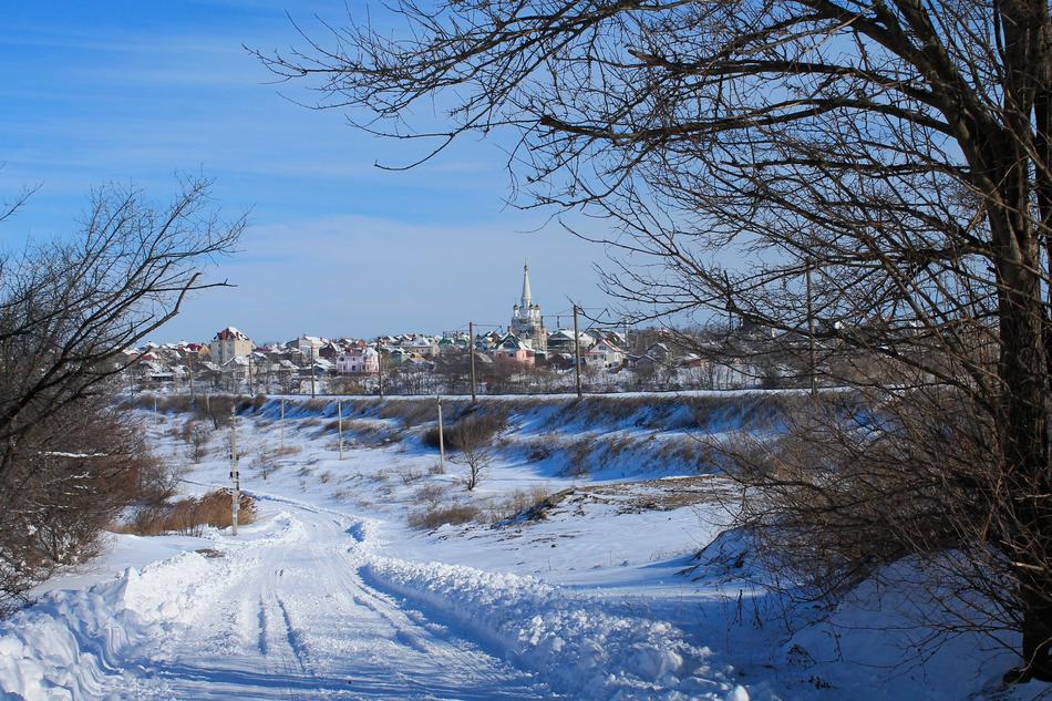 snowy landscape with city view