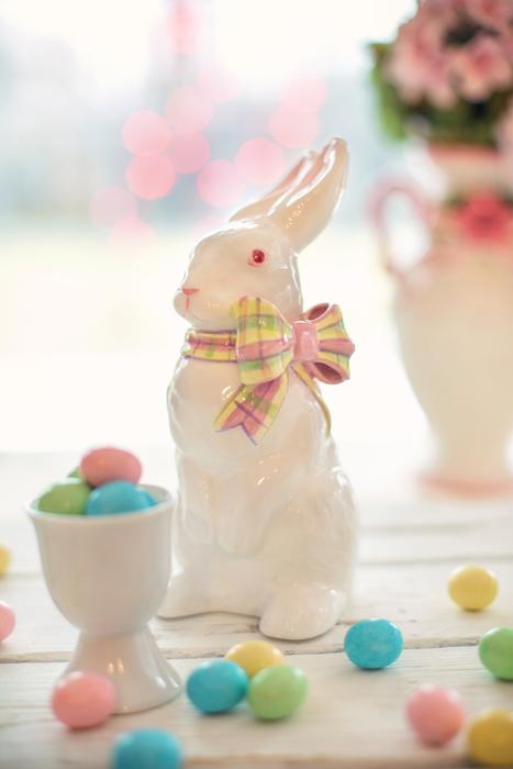 a white hare with colored eggs