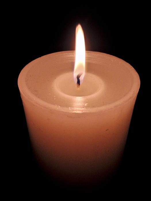 A candle burning in the night