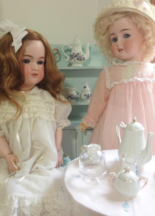 porcelain dolls in dresses