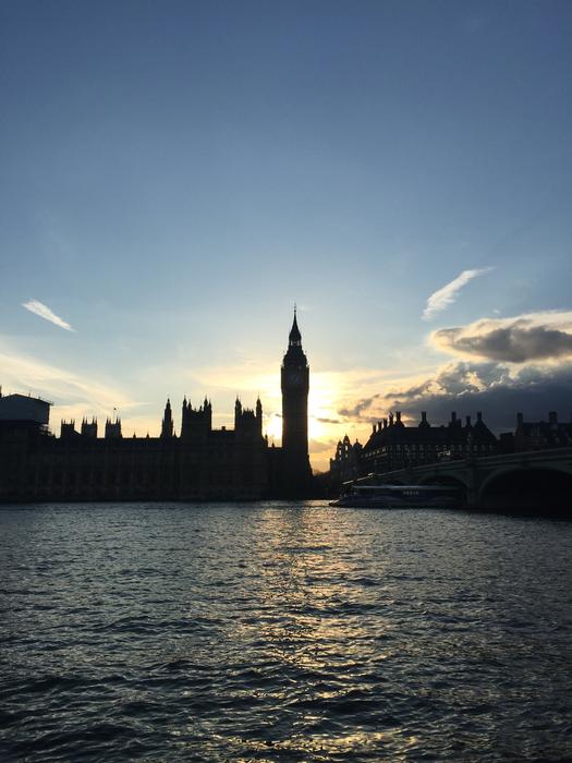 the silhouette of the tower with the light of the sun