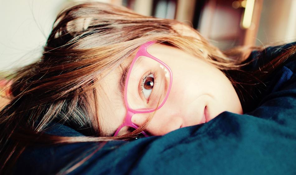 The girl with pink glasses