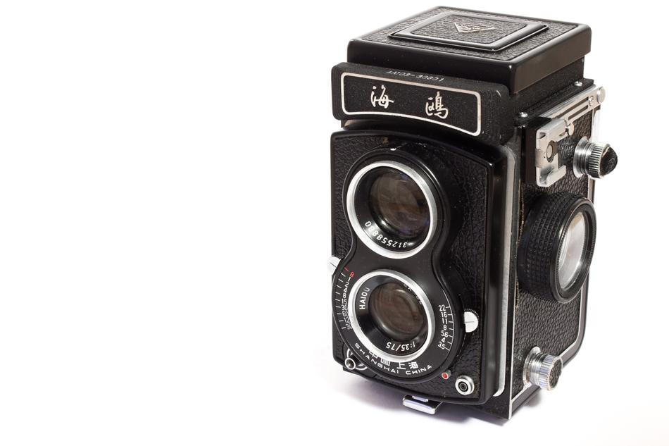 black camera on a white background
